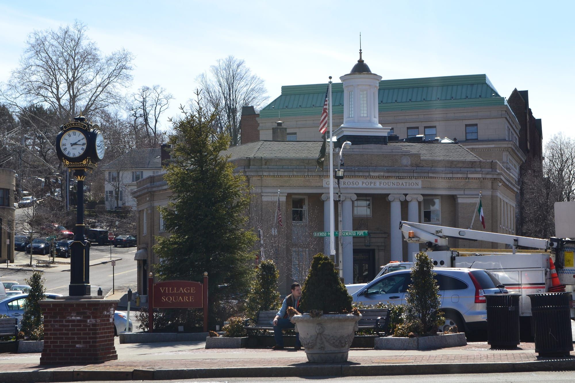Street clock and historic buildings in the village square of Tuckahoe